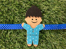 Load image into Gallery viewer, Boy in Blue | Handmade Magnetic Felt Rakhi
